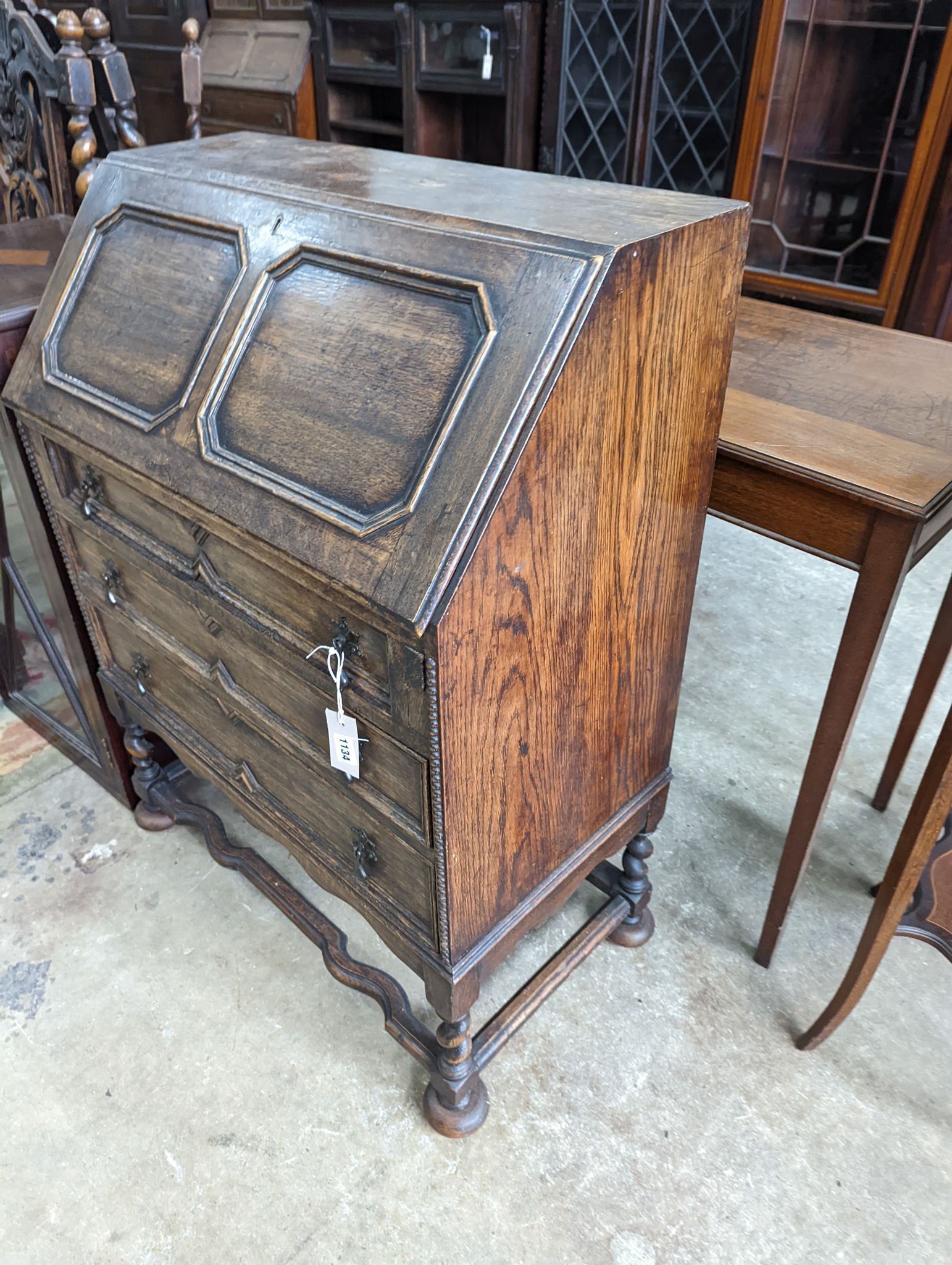 An early 20th century oak bureau, width 73cm, depth 41cm, height 99cm